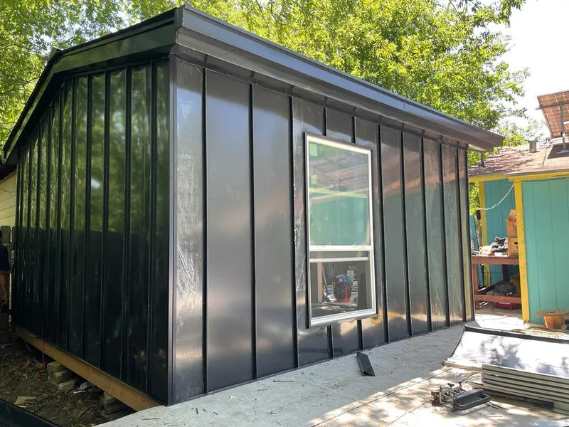 Black standing seam metal wall panels for Metal Roof Installation in Bridge City